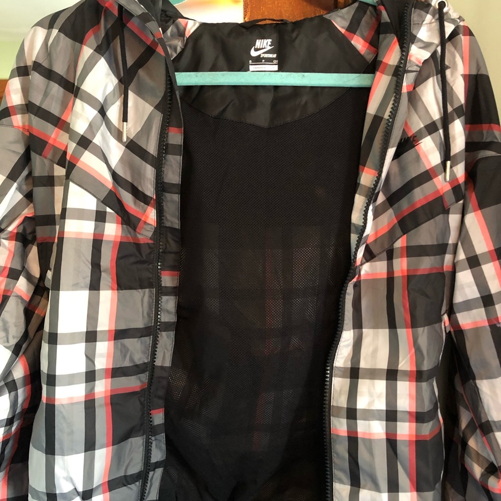 Nike track jacket.  Ladies Small 100% polyester.